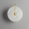 Wandgemonteerde LED-lamp in alabasterafwerking