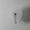 Wandgemonteerde LED-lamp in alabasterafwerking