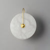 Wandgemonteerde LED-lamp in alabasterafwerking