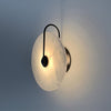Wandgemonteerde LED-lamp in alabasterafwerking