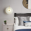 Wandgemonteerde LED-lamp in alabasterafwerking