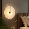 Wandgemonteerde LED-lamp in alabasterafwerking