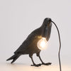 Raven-geïnspireerde hars tafellamp