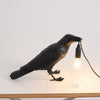 Raven-geïnspireerde hars tafellamp