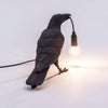 Raven-geïnspireerde hars tafellamp