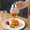 AmberDrop Druppelvrije Honingdispenser – Elegante Ontwerp